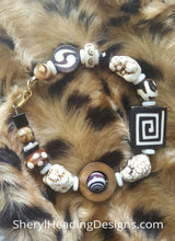 Exotic African Beads, Shell, and Onyx Beads with a Gold-Filled Clasp Bracelet - Sheryl Heading Designs